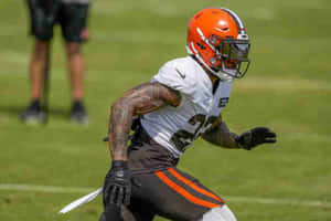 Football Player Training Session Wallpaper