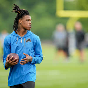 Football Player Training Session Wallpaper