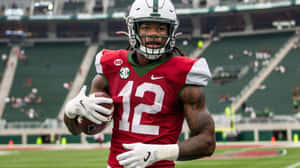 Football Player Travis Hunter Number12 Wallpaper