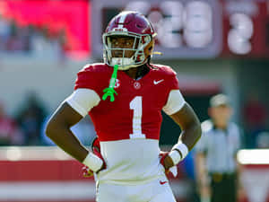 Football Player With Green Whistle Wallpaper