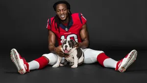 Football Playerand Bulldog Portrait Wallpaper