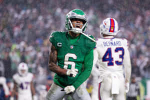 Football Playerin Green Jersey Number6 Wallpaper