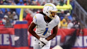 Football Playerin Rain Game Wallpaper