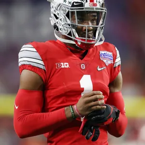 Football Playerin Red Uniform Number One Wallpaper