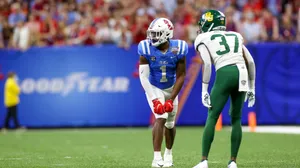 Football Players Faceoffat Game Wallpaper