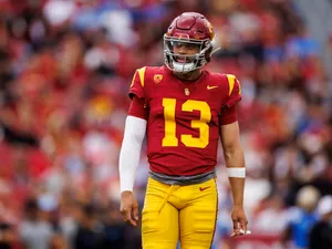 Football Quarterback In Action Wallpaper