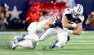 Football Tackle Action Shot Wallpaper