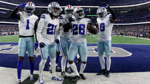 Football Team Celebrationat Stadium Wallpaper