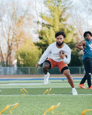 Football Training Drill Athlete Action Wallpaper