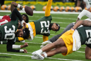 Football Training Session Fumble Wallpaper