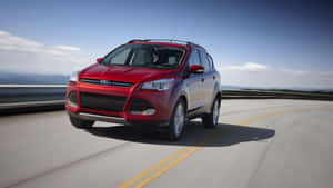 Ford Escape On A Picturesque Mountain Road Wallpaper