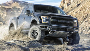 Ford Raptor Driving Off-road Wallpaper