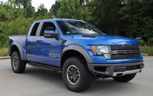 Ford Raptor In Blue Lightning Color Wallpaper