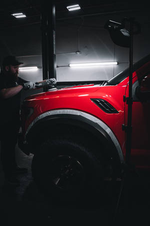 Ford Raptor In Custom Red Paint Wallpaper