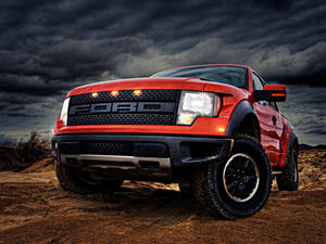 Ford Raptor In Metallic Orange Color Wallpaper