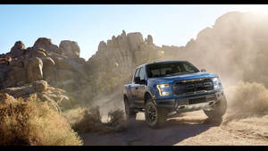 Ford Raptor In Rough Terrain Wallpaper