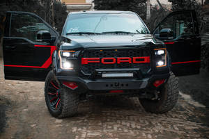 Ford Raptor With Custom Wordmark Logo Wallpaper