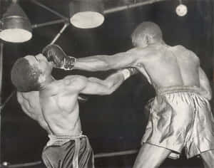Former Lightweight Champion Ike Williams In Action Wallpaper