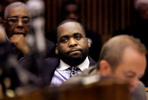 Former Mayor Kwame Kilpatrick Speaking At A Function Wallpaper