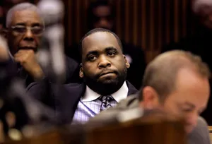 Former Mayor Kwame Kilpatrick Speaking At A Function Wallpaper
