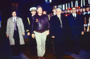 Former President Bill Clinton Delivering A Speech Wallpaper