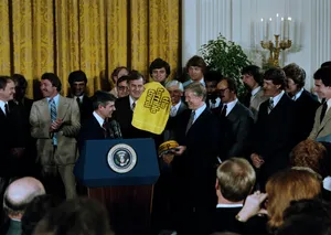 Former President Jimmy Carter Awarding Outstanding Individuals Wallpaper
