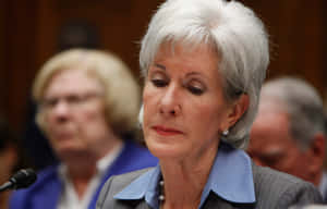 Former Secretary, Kathleen Sebelius, Giving A Speech Wallpaper