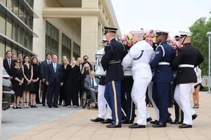 Former U.s. President George W. Bush Delivering A Speech Wallpaper