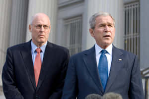 Former U.s. Secretary Of Treasury, Henry Paulson, In A Meeting With President George Bush Wallpaper