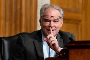 Former Vice President Tim Kaine Making A Shush Gesture Wallpaper