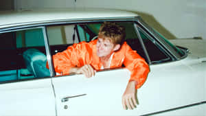 Forrest Frank Driving Vintage Car Wallpaper