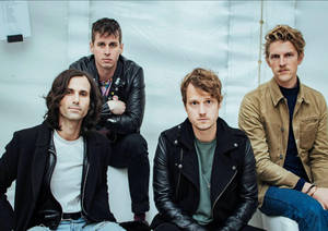 Foster The People With Serious Looks Wallpaper