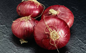 Four Red Onions Wallpaper