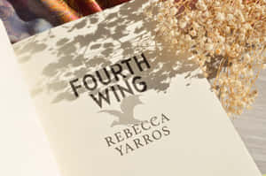 Fourth Wing Book Coverwith Floral Shadow Wallpaper