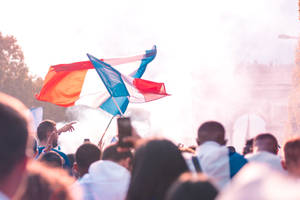 France Flags With Crowd Of Patriots Wallpaper