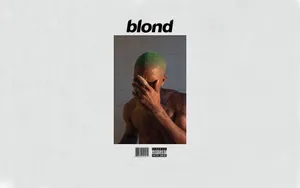 Frank Ocean With A Laptop, Showing Off His Creative Side. Wallpaper