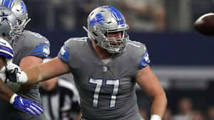 Frank Ragnow Wearing Grey Detroit Lions Jersey Wallpaper