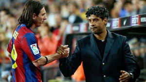 Frank Rijkaard And Lionel Messi Wallpaper