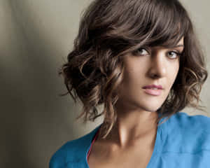 Frankie Shaw Striking A Pose During A Photoshoot Wallpaper