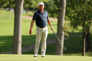 Fred Funk Standing On Golf Course Wallpaper