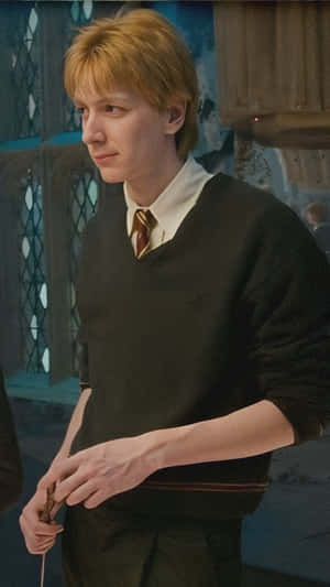 Fred Weasley Casual Hogwarts Look Wallpaper
