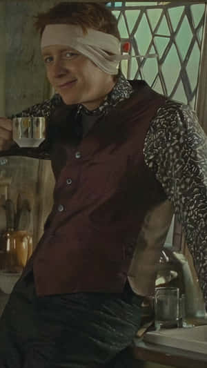 Fred Weasley Casual Moment Wallpaper