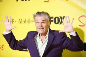 Fred Willard Celebrating An Award Win Wallpaper