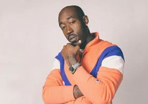 Freddie Gibbs Contemplative Pose Wallpaper