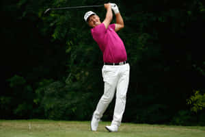 Freddie Jacobson Smiling While Golfing Wallpaper