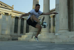 Freestyle Soccer Trickin Frontof Classic Architecture Wallpaper