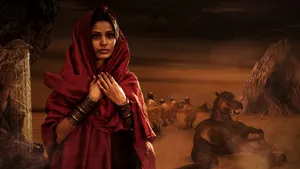 Freida Pinto Striking A Pose In A Stunning Photoshoot Wallpaper