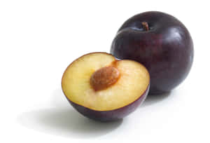 Fresh And Juicy Purple Plums Wallpaper