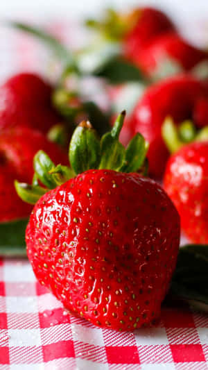 Fresh And Juicy Red Strawberries Wallpaper