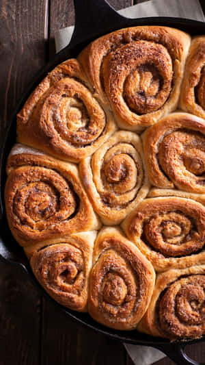 Fresh Baked Cinnamon Rollsin Cast Iron Skillet.jpg Wallpaper